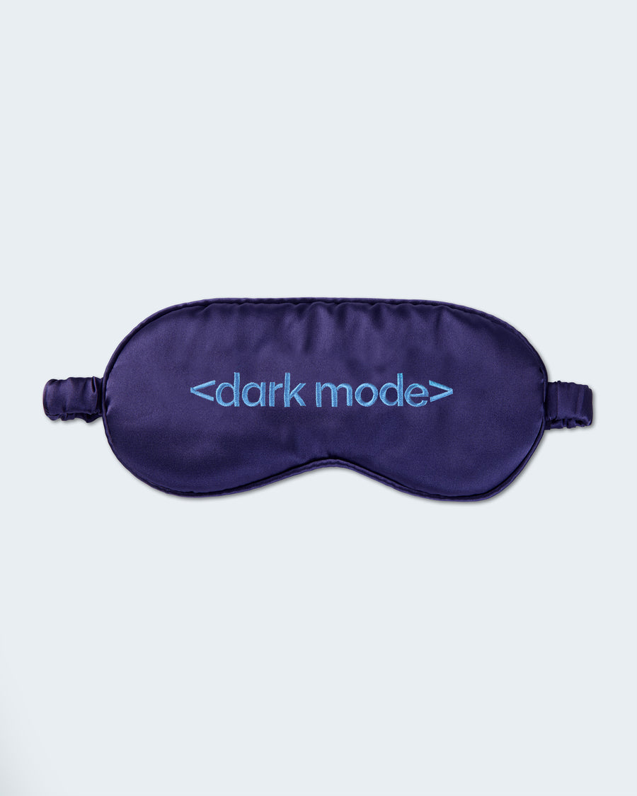 Dark purple sleep mask with "dark mode" embroidery.