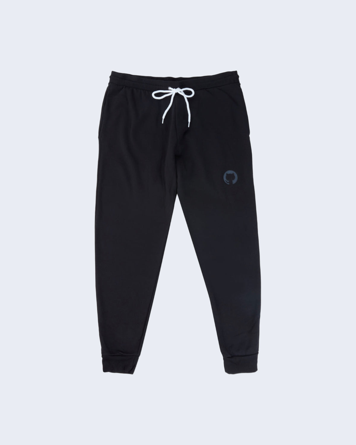 Black joggers with white drawstring waistband, side pockets, cuffed ankles, and featuring black Invertocat logo embroidered on the left thigh.