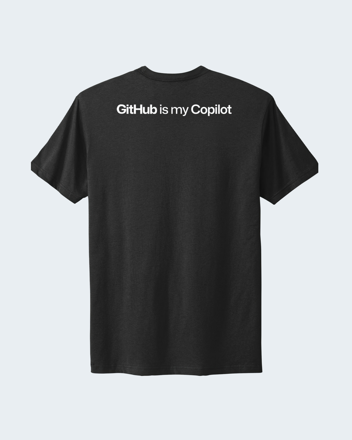 Back view of Copilot T-shirt in black featuring 'GitHub is my Copilot' statement in white at the top part.