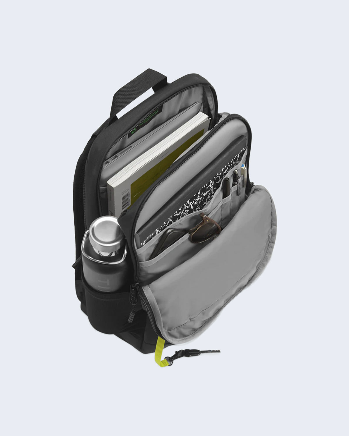 Detail view of Open black Laptop Backpack showing organized compartments and a side pocket.