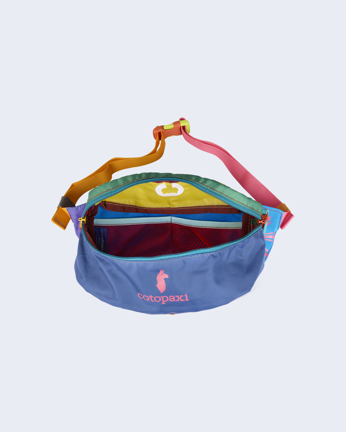 Detail view of Bataan Hip Pack unzipped, showing multicolor interior mesh pockets.