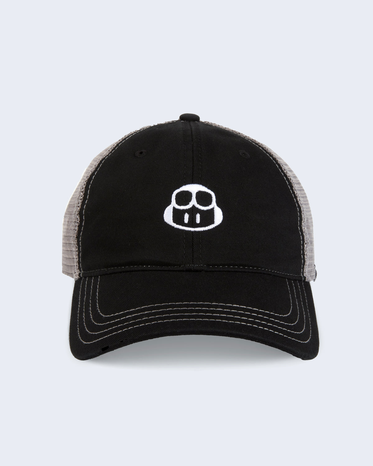 trucker hat in black with gray mesh on the back featuring embroidered CoPilot logo in white at the front panel
