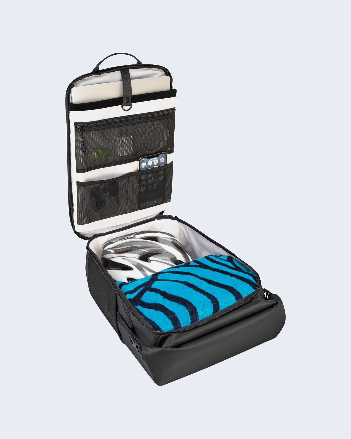 Detail view of the Invertocat MiiR laptop backpack interior opened to display compartments and pockets.