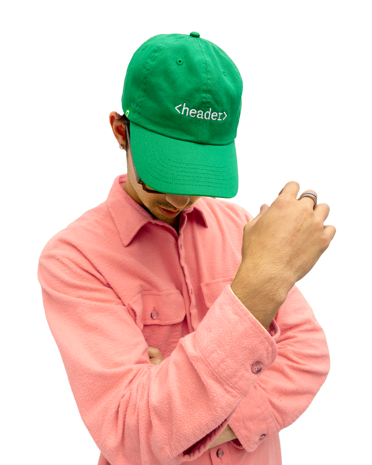 Male model wearing the green Header Hat