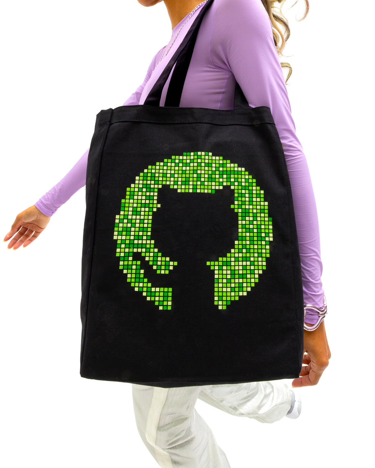 Female model carrying the Contribution Graph Tote