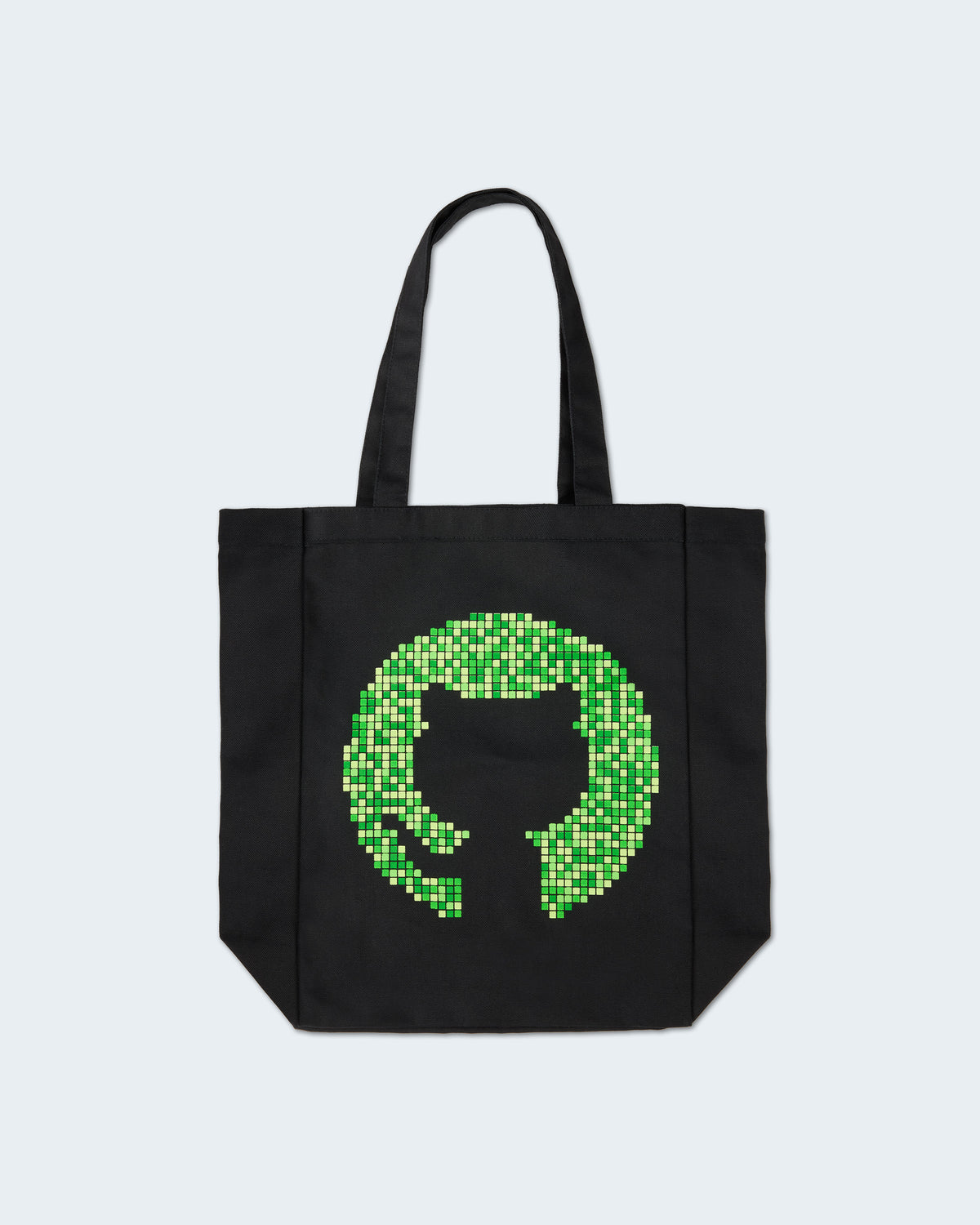 Black canvas tote bag featuring neon green GitHub Invertocate logo made of contribution graph squares