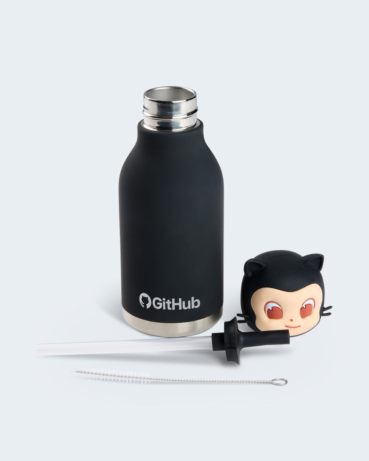 Black GitHub water bottle with a Mona-shaped lid, straw attachment, and cleaning brush.