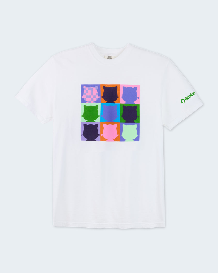 White short-sleeve t-shirt featuring a colorful nine-panel grid of Mona head silhouettes in assorted purple, blue, green, pink, and orange colors on the front chest. A small green GitHub logo graphic is printed on the left sleeve. #color:White