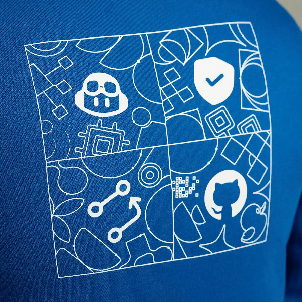 Photo of the backside of the blue Universe 2023 hoodie, showing detail of the graphic print.