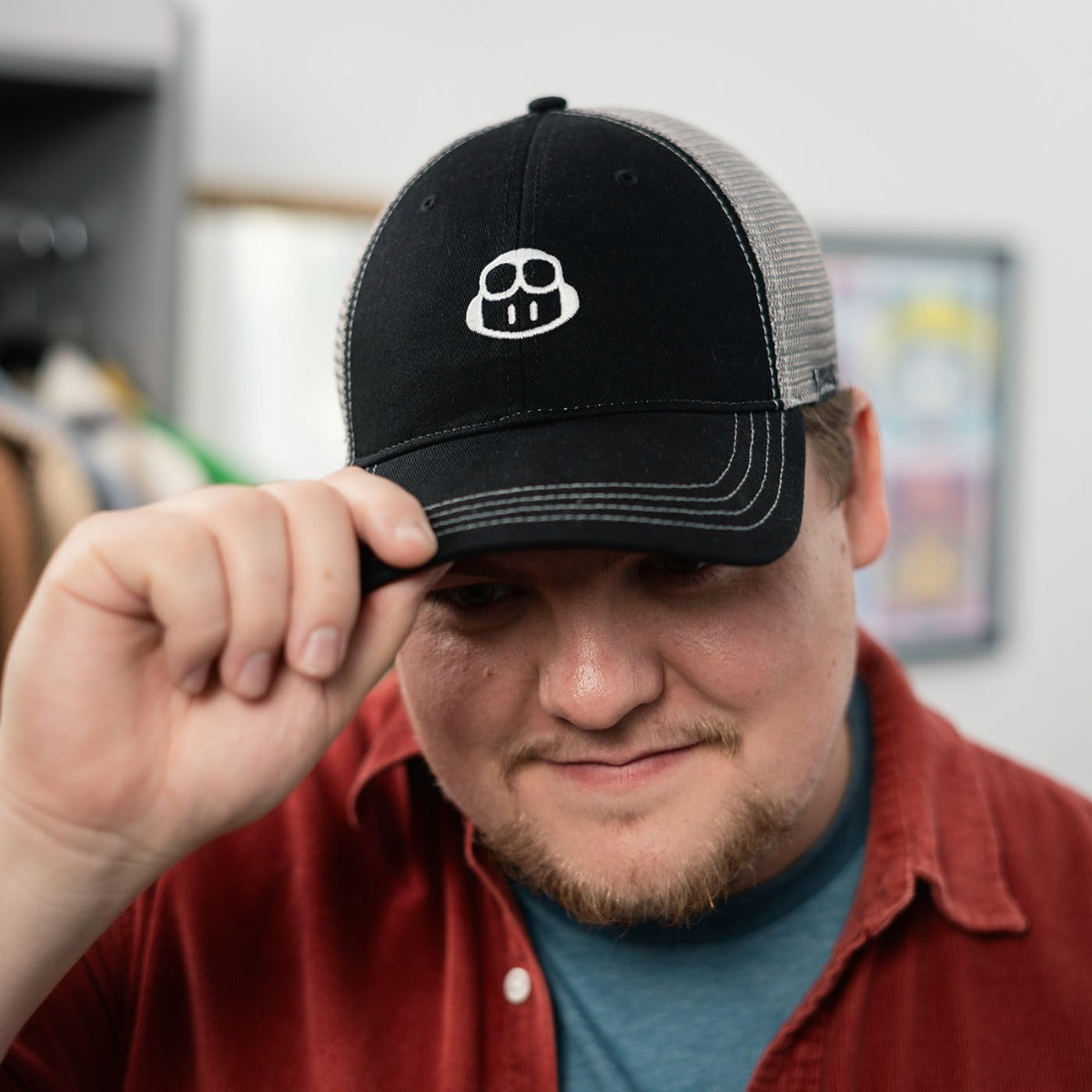 Photo of man wearing Copilot Trucker Hat