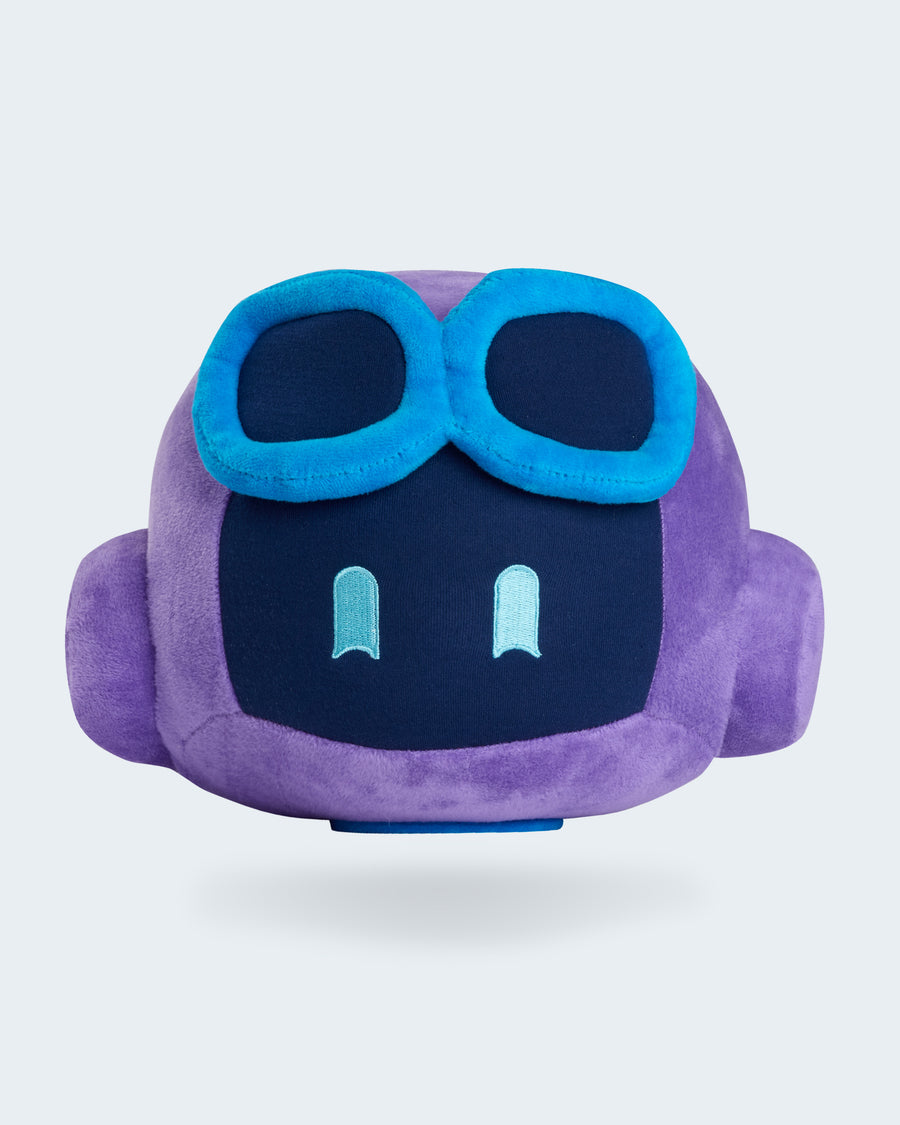 Purple GitHub Copilot plush toy with a soft rounded shape, embroidered face, and blue goggles