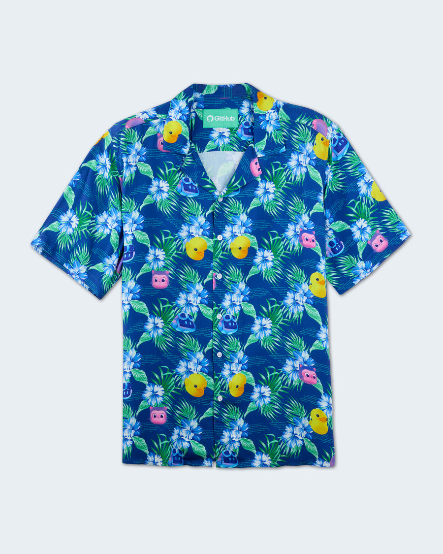 Blue tropical button-up shirt with floral, Copilot, Mona, and Ducky pattern.