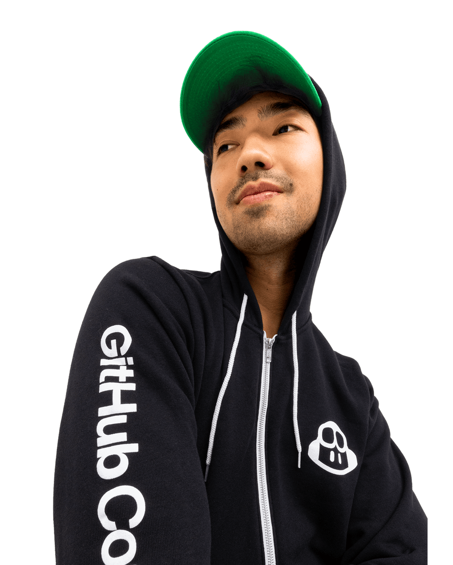 Photo of a model wearing the Github Copilot zip up hoodie